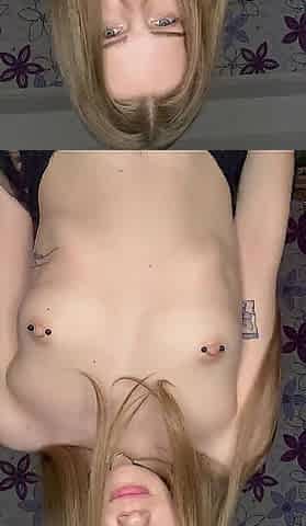 Student with tiny pierced breasts