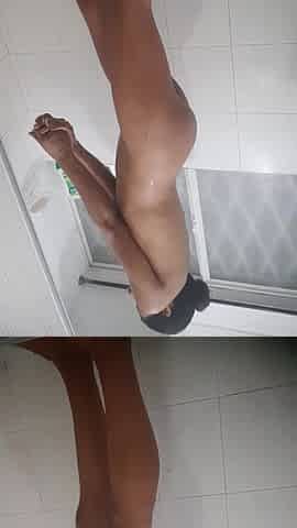 Delicate brunette hair takes a very hot shower and soaps up