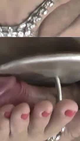 Andrea in Homemade Footjob POV