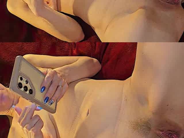 Nude on the couch. I look at porn clips.