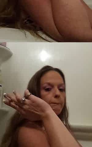 Filming Sexy Brunette hair Smokin' Cigarettes In Bathtub