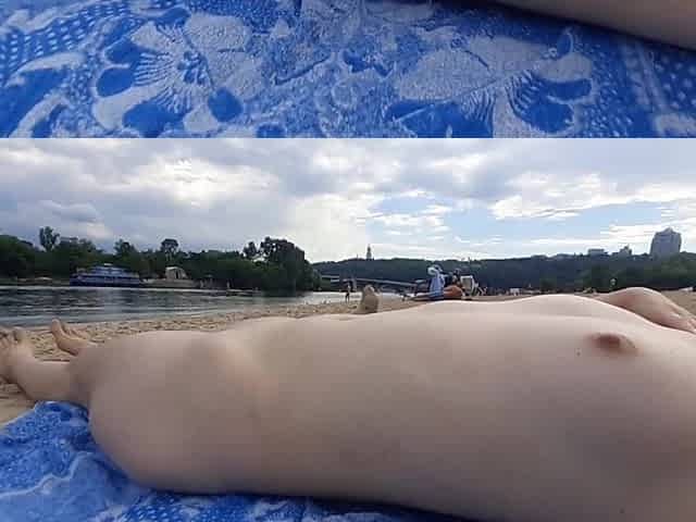Angel fondles herself on a in nature's garb beach