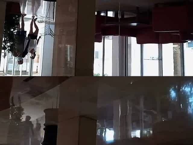 Public Nudity in a Hotel Lobby - No Panties Flash