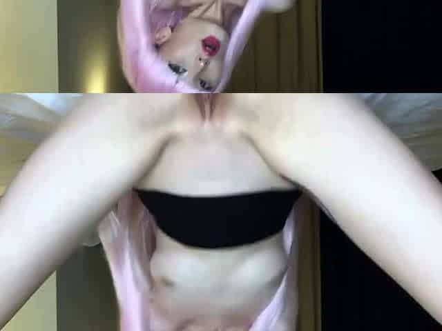 Pink-haired babe toys her pussy with a dildo