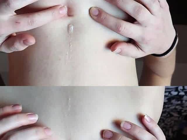 Redhead babe fingers her belly button