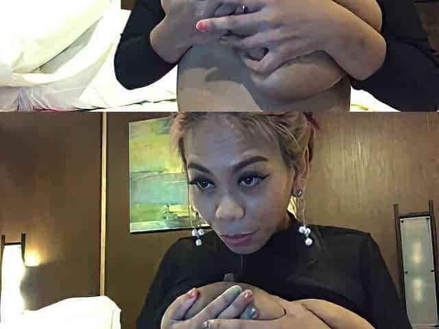 Busty Filipina Coco sucks big brown nipples on cam
