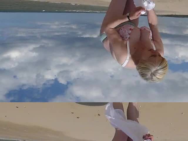 Wife walking on beach