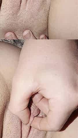 Her vagina gets leaking moist from playing with the clitoris