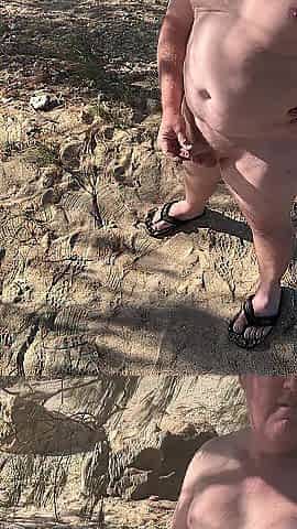 Waking on bare beach
