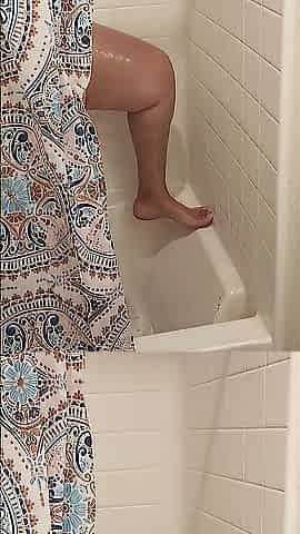 Wife gets caught playing with her vagina in the shower by spouse