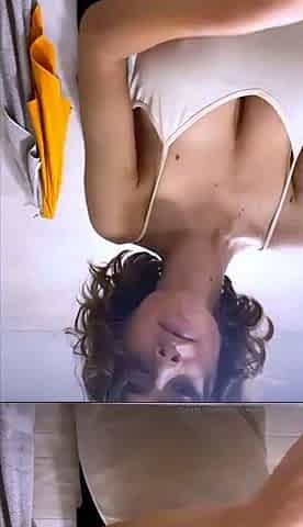Busty curly brunette with big boobs fucks on couch