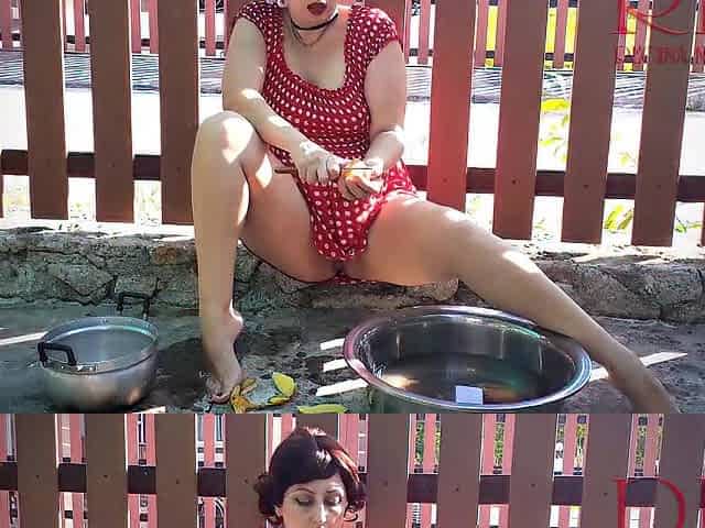 Retro maid prepares potatoes for dinner. Vintage performance. 1
