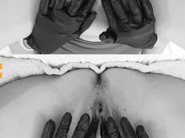 Peeing in Bed with Black Latex Gloves