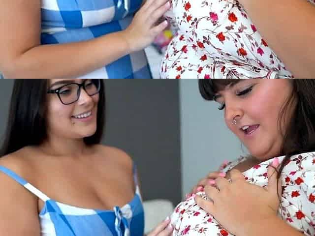 Busty babe playing with her big boobs