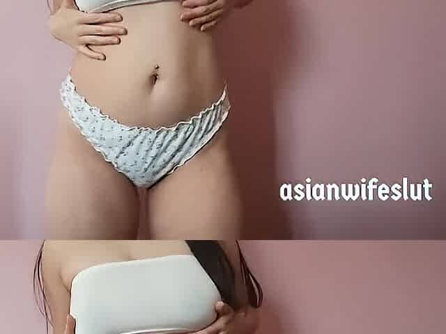 Oriental floozy wife rubs clitoris over pants