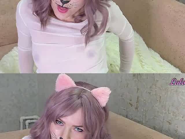 A gentle kitty in white tights plays with her throat with a large knob