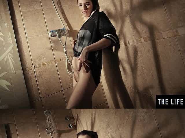 Watch cute girl get soaked as she rubs her pussy in the shower