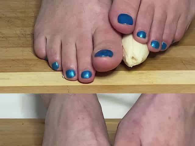 Smutty play with a banana underneath my feet