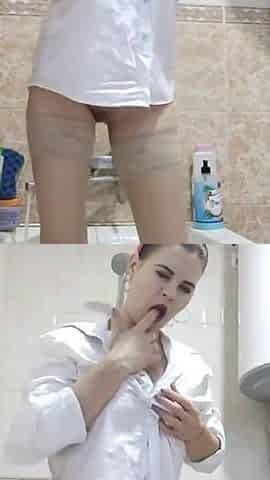 I take a shower, masturbate, pose, play with my holes with a toy and foam, bring myself to orgasm.