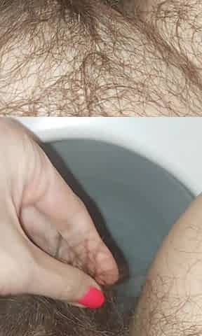 Pissing Woman in the Toilet