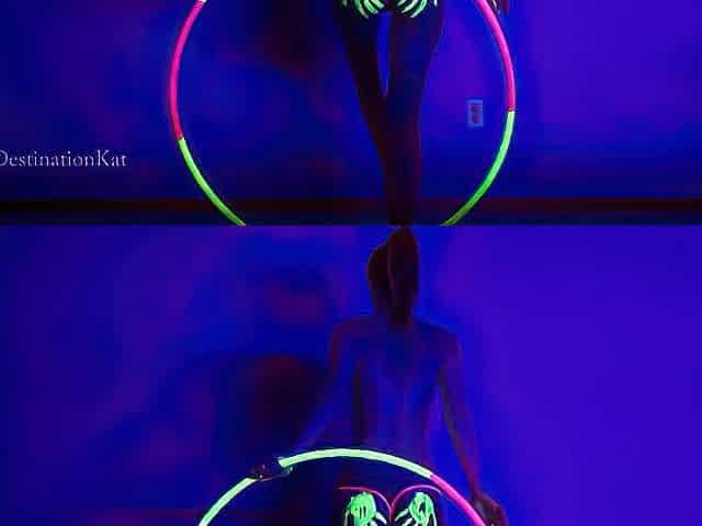 Dances And Hula Hoops Under A Black Light