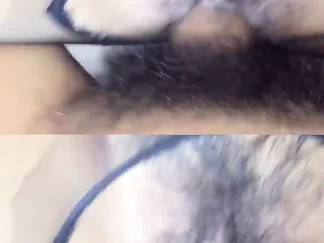 Pink labia close up of naive brunette playing with her name