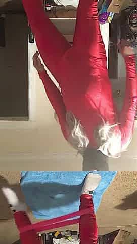 Yoga resistance band wearing red spandex and wig (Raunchy Edition)