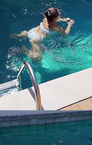 Stepmom Seduced Her Stepson in a Pool