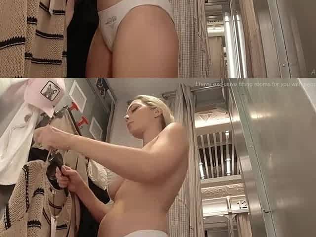 A sexy hottie tries on clothing on her bare body and inserts a booty-plug into her booty.