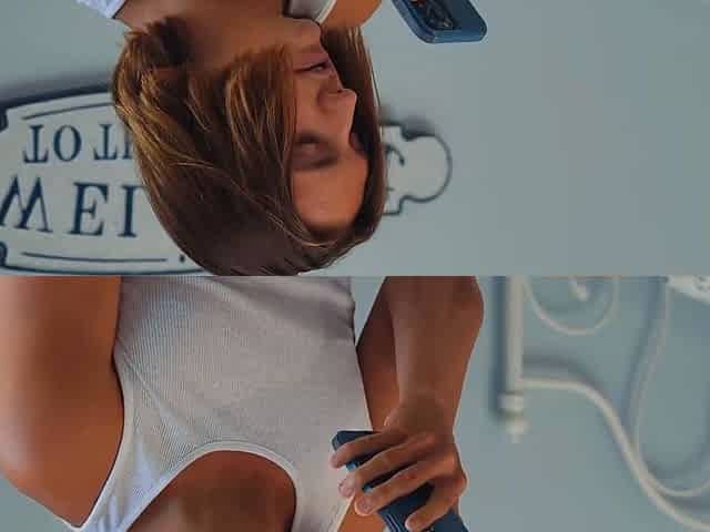Savor the view of Stepmom's clean-shaved vagina in
