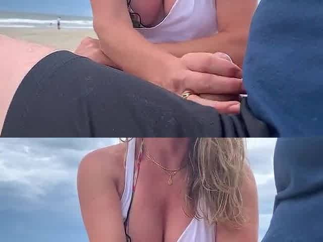 That babe made a stranger cum on a public beach