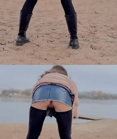 Walking along the beach without panties.