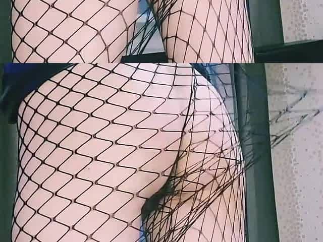 An aunt with glasses and fishnet tights is flirting with u