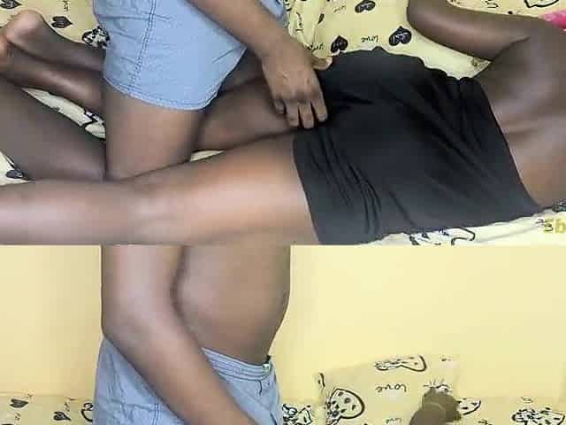 A youthful Afro woman tempted by a large ebony ramrod