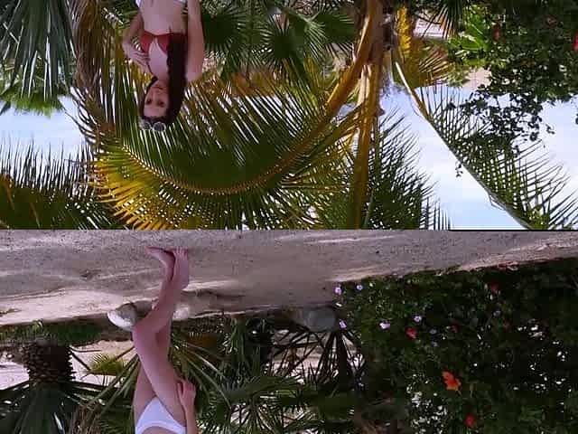 Busty petite MILF strips naked outdoors