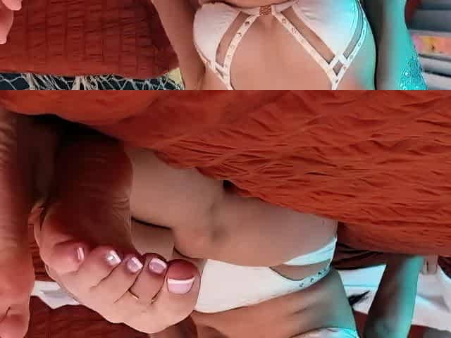 Brunette with foot fetish rubs big dick with her feet in POV