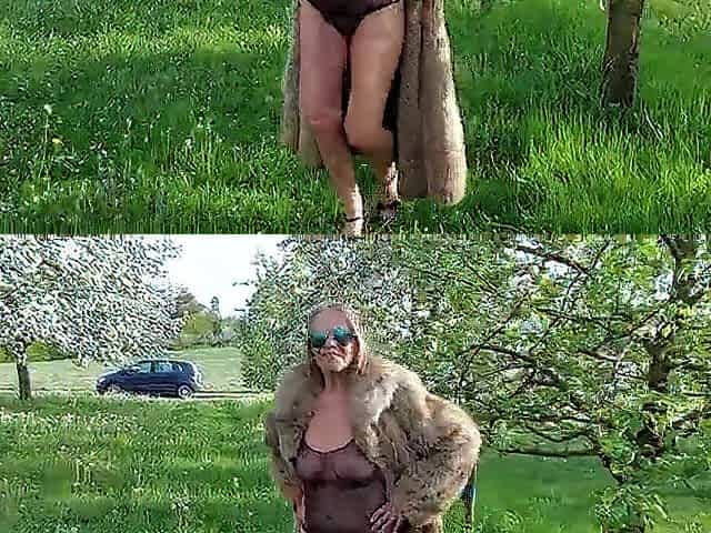 A older woman is walking around outside in a watch-throughout bodysuit!