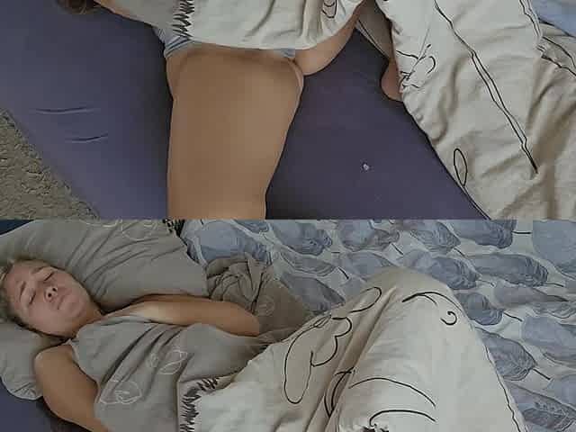 She plays with her pussy under the blanket and gets a legs-shaking orgasm