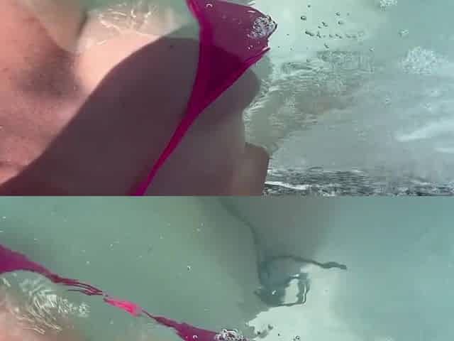 Artemisia Love showing her wet large titties in a micro bikini underwater Link. in bio