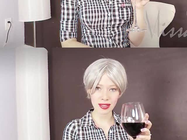 Blonde lady with red lips is gently sucking her lover's cock, instead of his wife