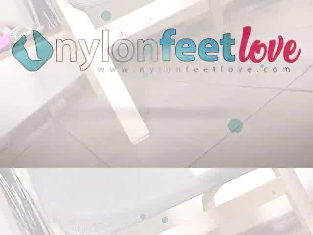 Sofia with her feet on a tiny table