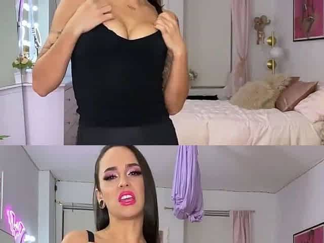 Busty babe playing with her big boobs