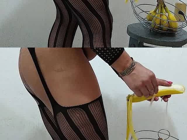 Sissy in micro chastity cage pushing 2 bananas up her butt. Sissy in body nylons.