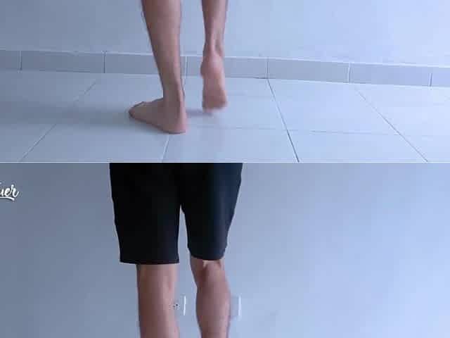 Lengthy legs and hot feet doing squats during the time that stripping