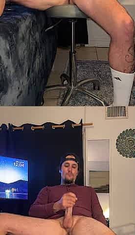 Sexy tatted guy, legs widen and leaned back jerking off his large butt penis