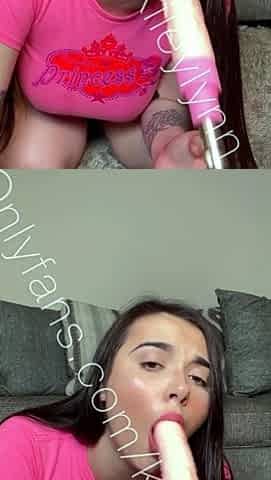 Busty babe playing with her big boobs