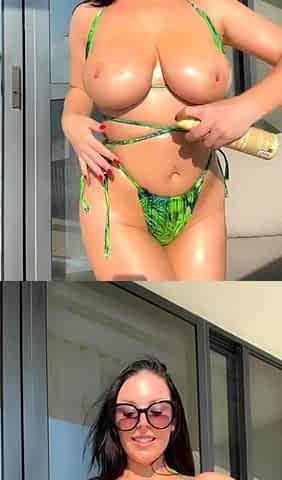 Busty babe playing with her big boobs