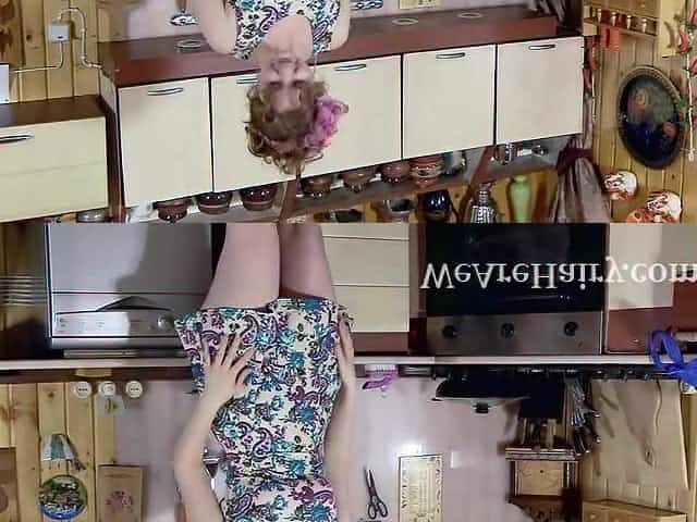 Bazhena masturbates in her kitchen
