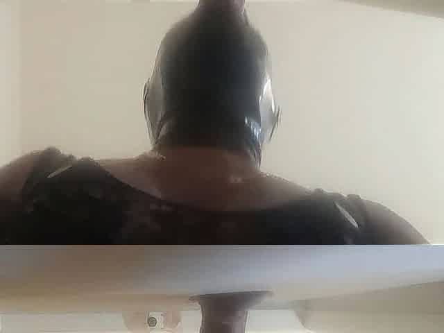 Wearing high heels and catsuit and taking a shlong down my throat and vagina in gloryhole
