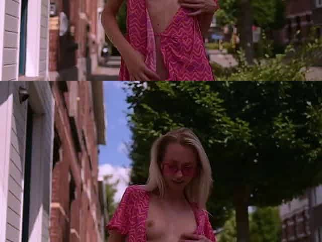 Outdoor solo masturbation scene with curly blonde